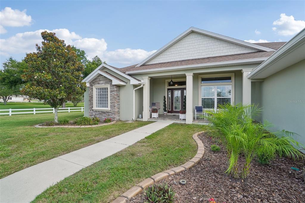 3934 Connersville Road Bartow, FL 33830 - Photo 53 of 81 a front view of a house with a yard