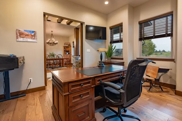 a room with furniture and wooden floor