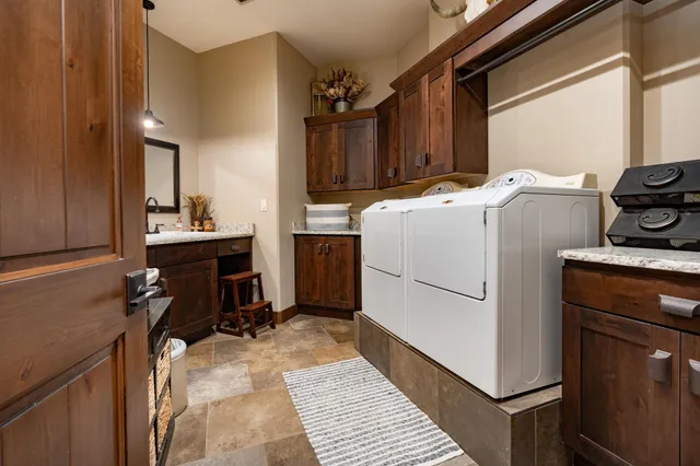 a utility room with dryer and washer