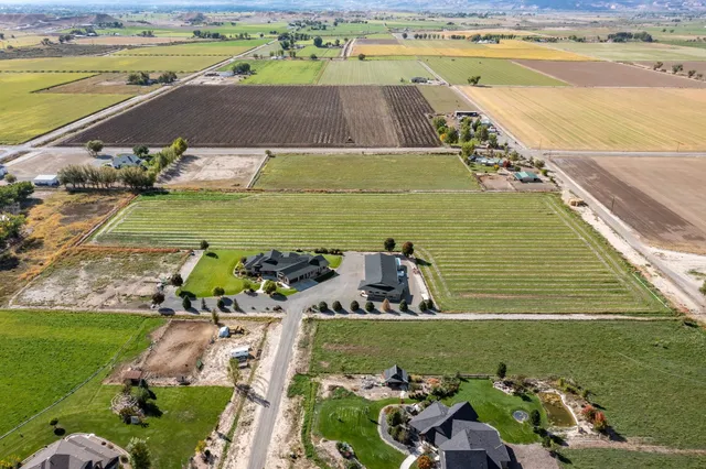 a view of a lake with a yard