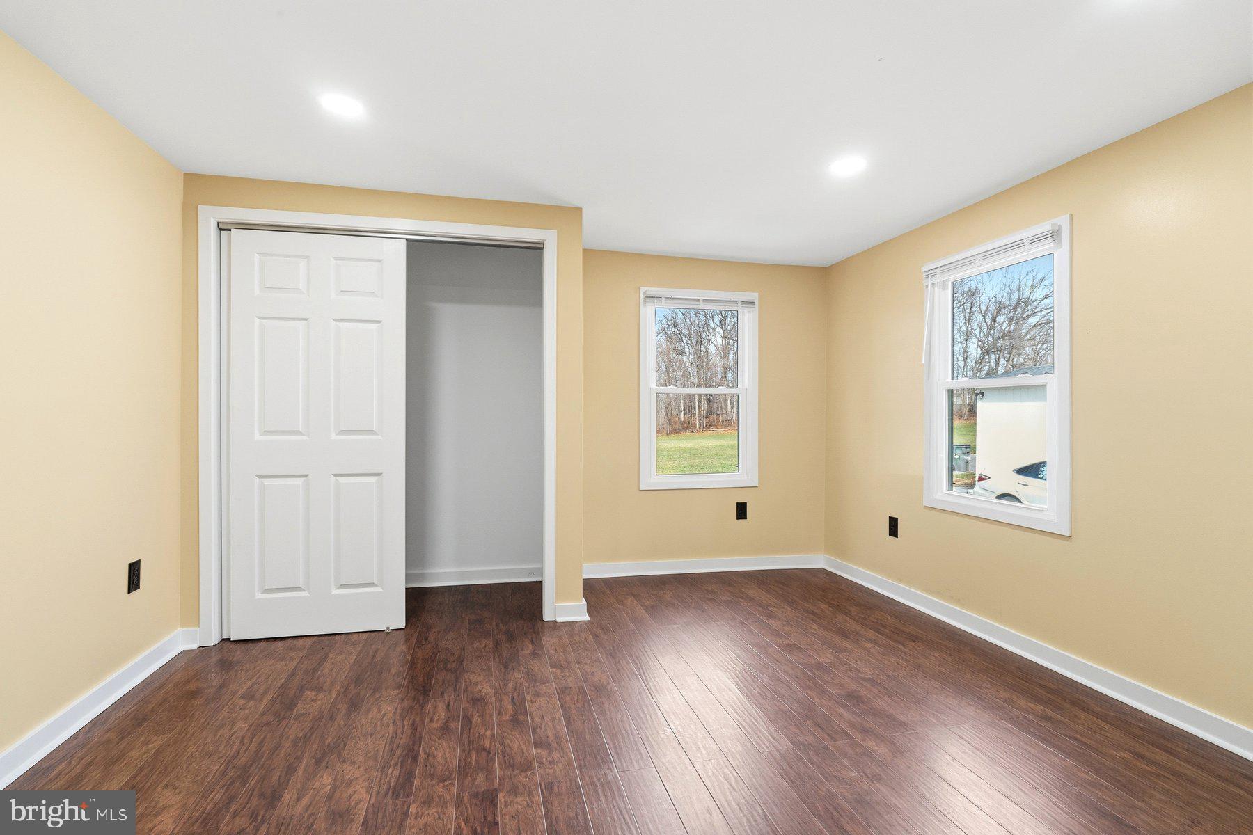 1973 Deer Park Road, Unit 3 Finksburg, MD 21048 - Photo 6 of 16 an empty room with wooden floor and windows