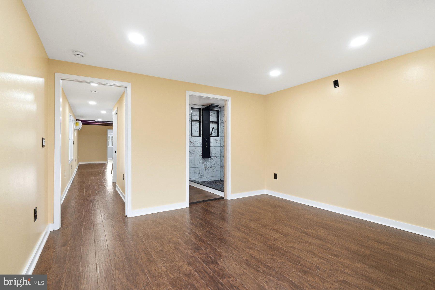 1973 Deer Park Road, Unit 3 Finksburg, MD 21048 - Photo 7 of 16 a view of an empty room with wooden floor