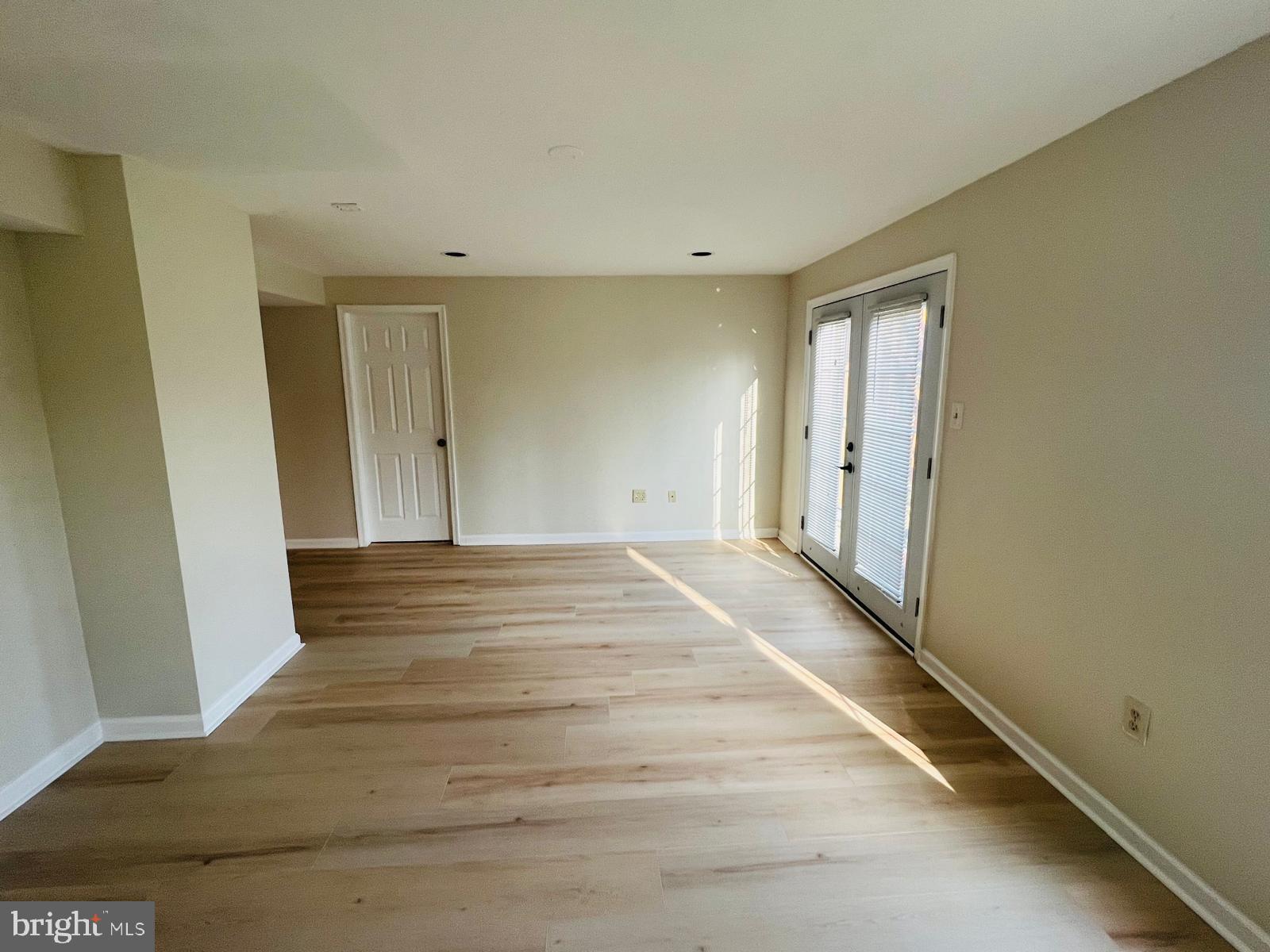 13249 # Lane Silver Spring, MD 20904 - Photo 14 of 34 a view of a room with wooden floor and bathroom