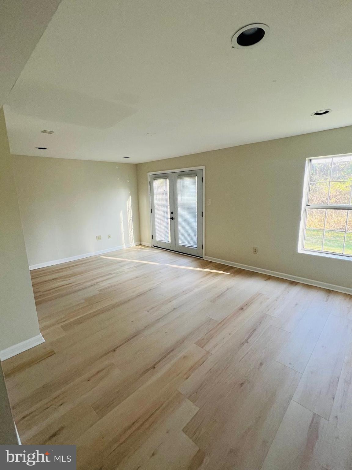 13249 # Lane Silver Spring, MD 20904 - Photo 15 of 34 an empty room with windows