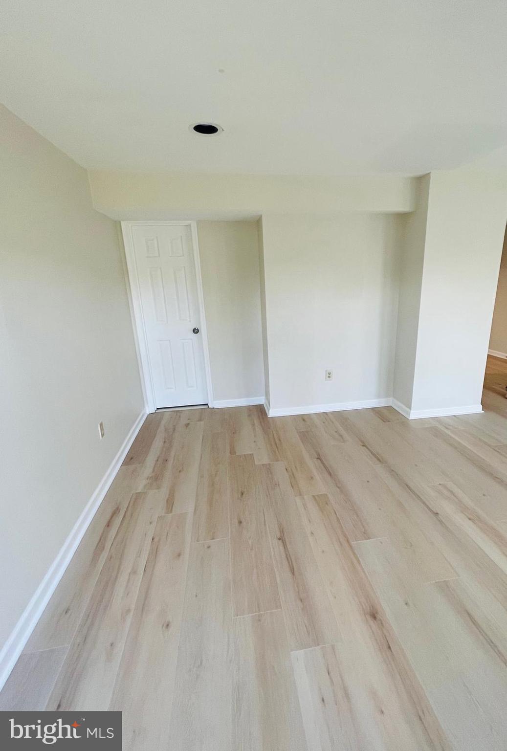 13249 # Lane Silver Spring, MD 20904 - Photo 16 of 34 a view of a room with wooden floor