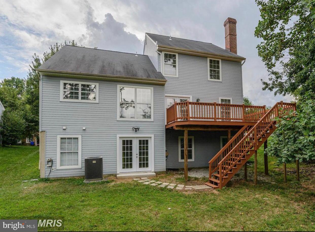 13249 # Lane Silver Spring, MD 20904 - Photo 8 of 34 a view of a house with a backyard