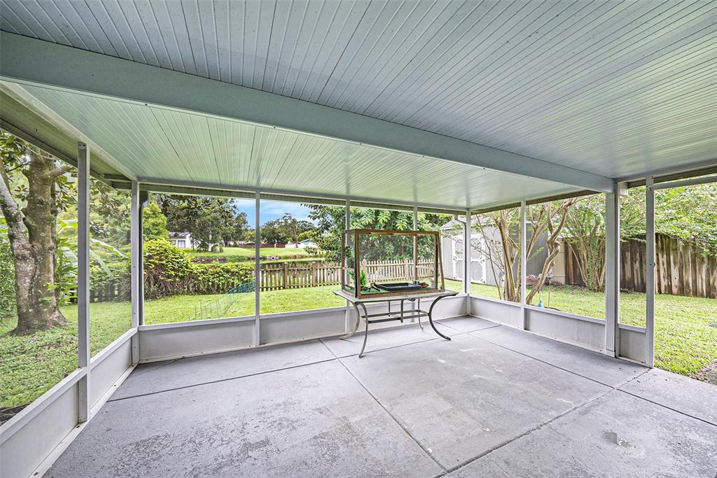 4805 Grove Point Drive Tampa, FL 33624 - Photo 24 of 35 a view of an empty room with porch and a patio