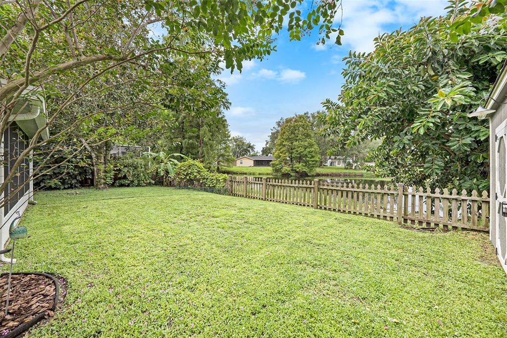 4805 Grove Point Drive Tampa, FL 33624 - Photo 28 of 35 a view of a balcony with a yard