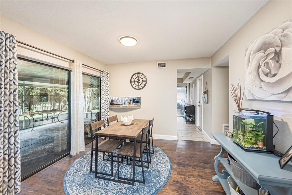 4805 Grove Point Drive Tampa, FL 33624 - Photo 7 of 35 a dining room with furniture and window
