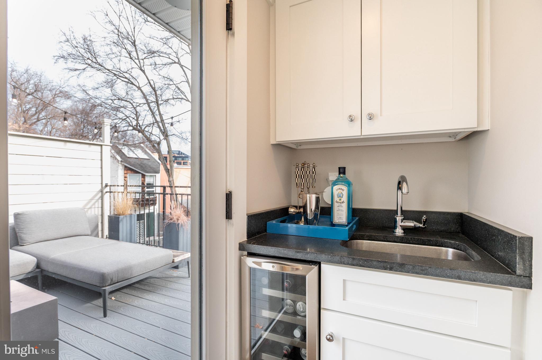 1921 35th Place Northwest, Unit 2 Washington, DC 20007 - Photo 17 of 29 Top floor wet bar