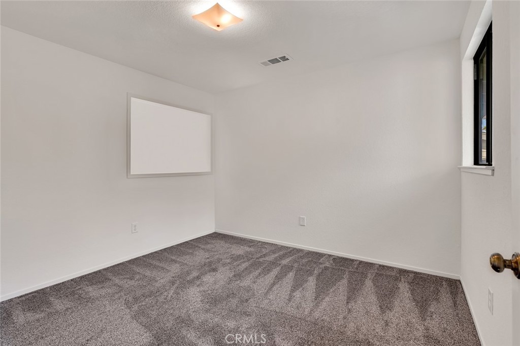 3350-74 M Street Merced, CA 95348 - Photo 17 of 55 an empty room with windows