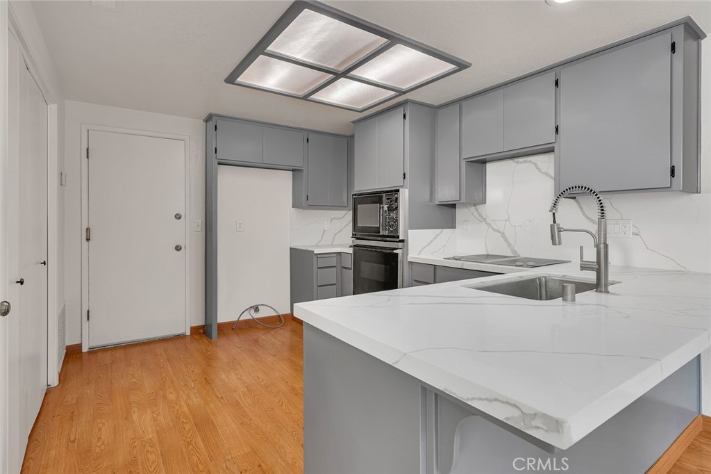 3350-74 M Street Merced, CA 95348 - Photo 2 of 55 a kitchen with stainless steel appliances a refrigerator and a sink