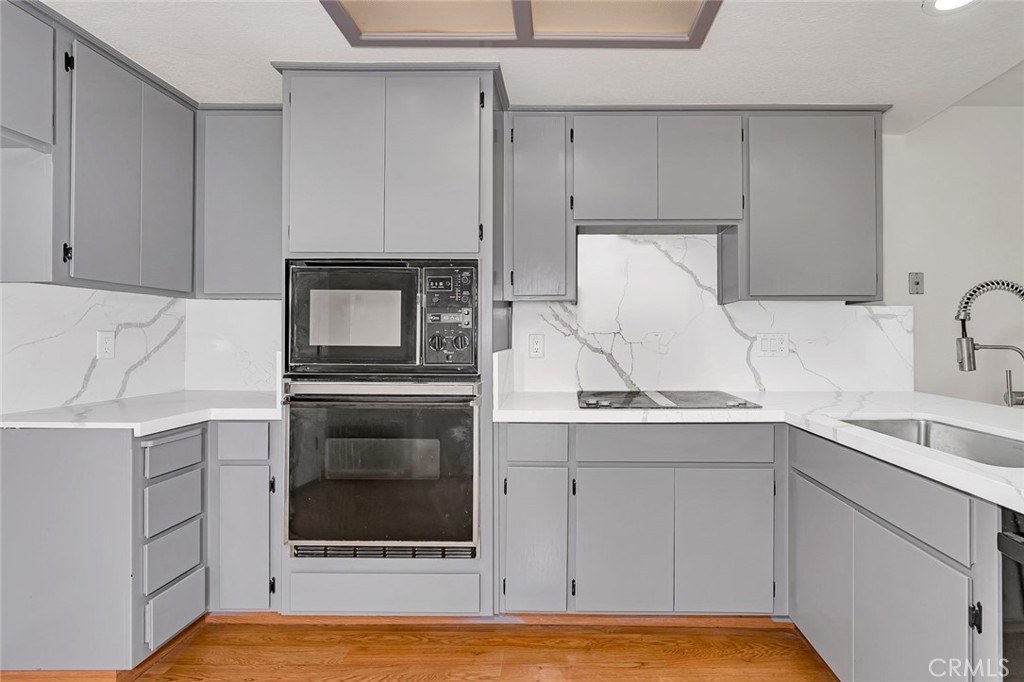 3350-74 M Street Merced, CA 95348 - Photo 3 of 55 a kitchen with a sink and a stove top oven
