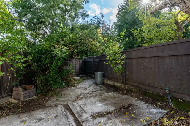 a view of a swimming pool with a sitting area