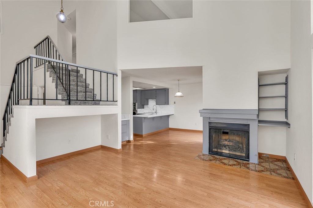 3350-74 M Street Merced, CA 95348 - Photo 9 of 55 a view of a livingroom with an empty space and a fireplace