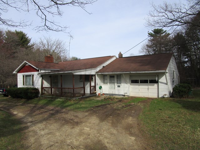 3826 Miola Road Clarion, PA 16214 - Photo 1 of 1 a front view of a house with a garden