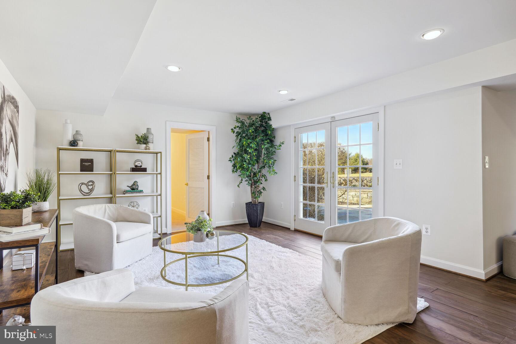 12313 Riding Fields Road Rockville, MD 20850 - Photo 17 of 42 Multiple seating areas in Lower level