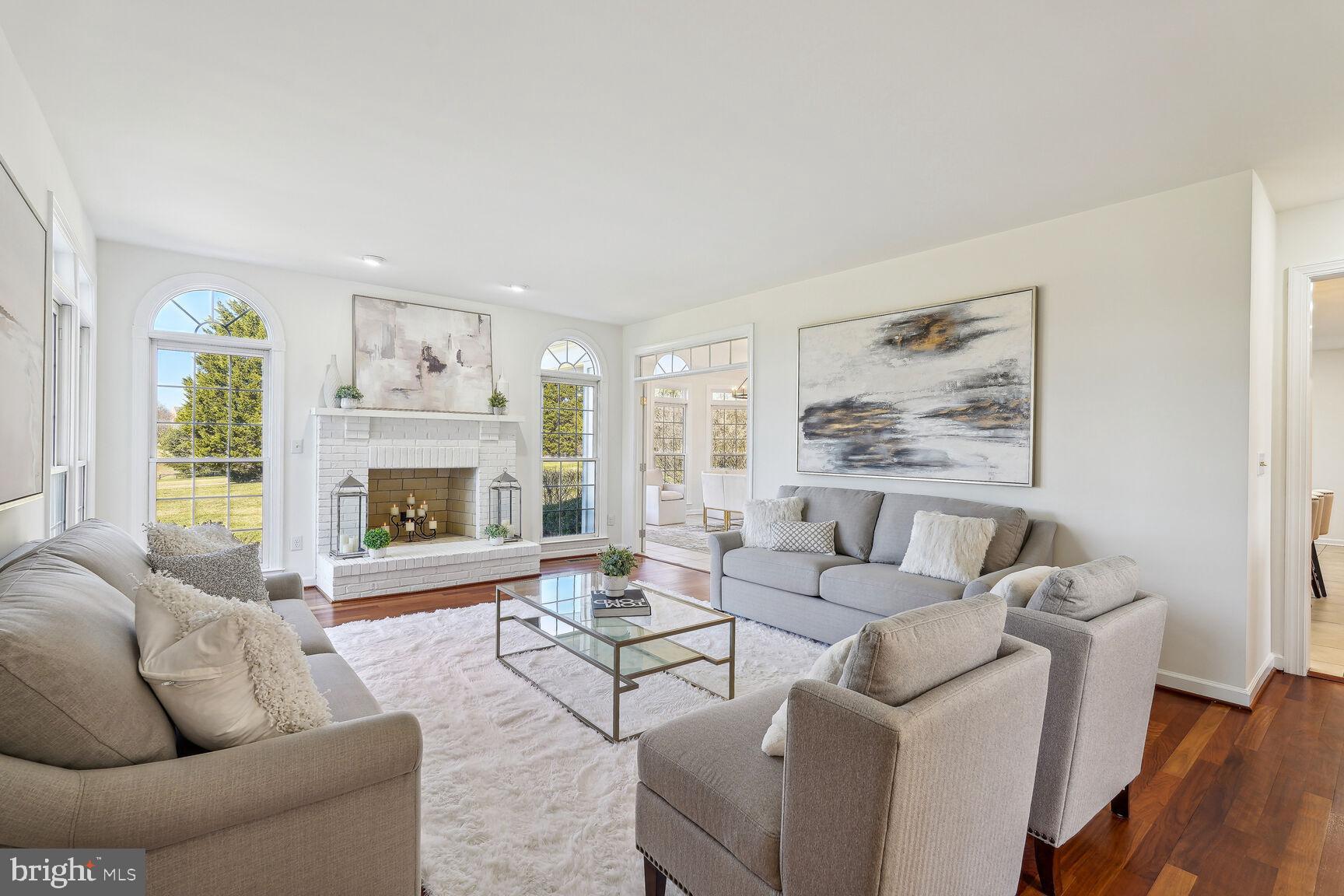 12313 Riding Fields Road Rockville, MD 20850 - Photo 6 of 42 Bright Family room with wood burning fireplace