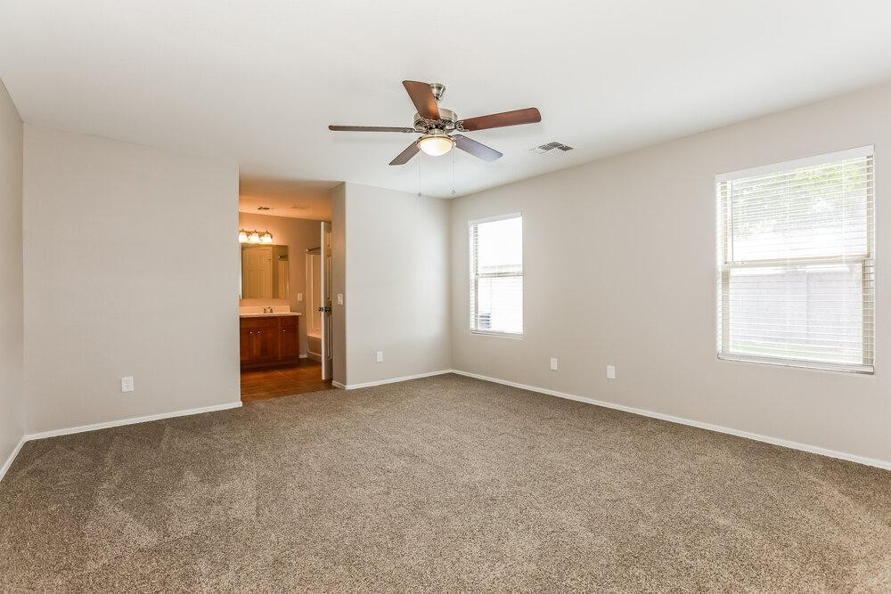 30559 North Nightingale Road San Tan Valley, AZ 85143 - Photo 11 of 16 a view of an empty room with a window