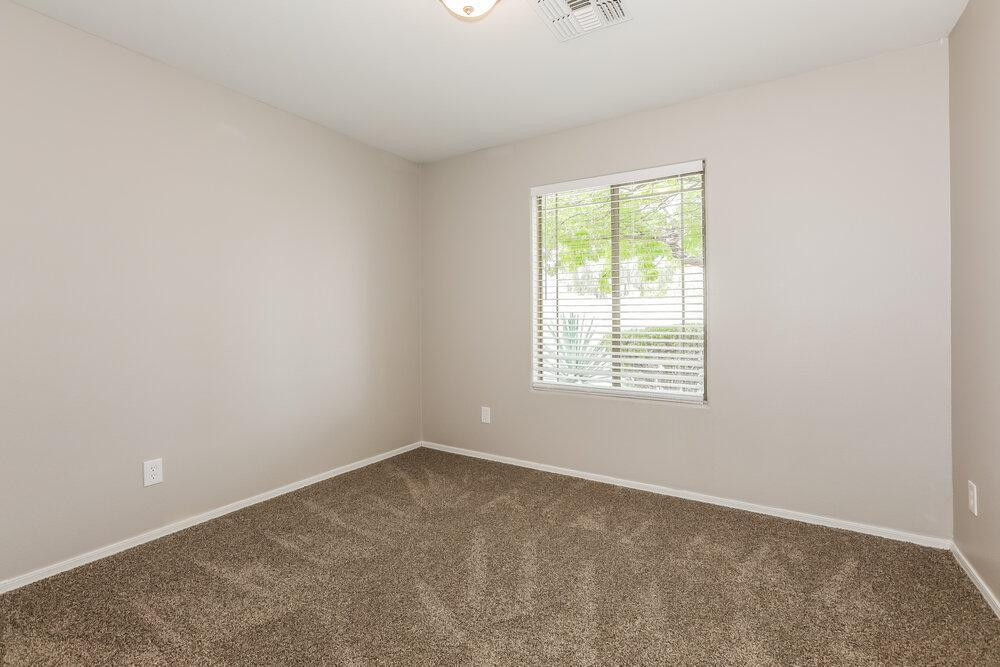 30559 North Nightingale Road San Tan Valley, AZ 85143 - Photo 12 of 16 an empty room with a window