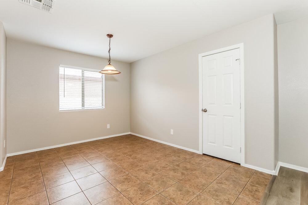 30559 North Nightingale Road San Tan Valley, AZ 85143 - Photo 6 of 16 a view of an empty room with a window