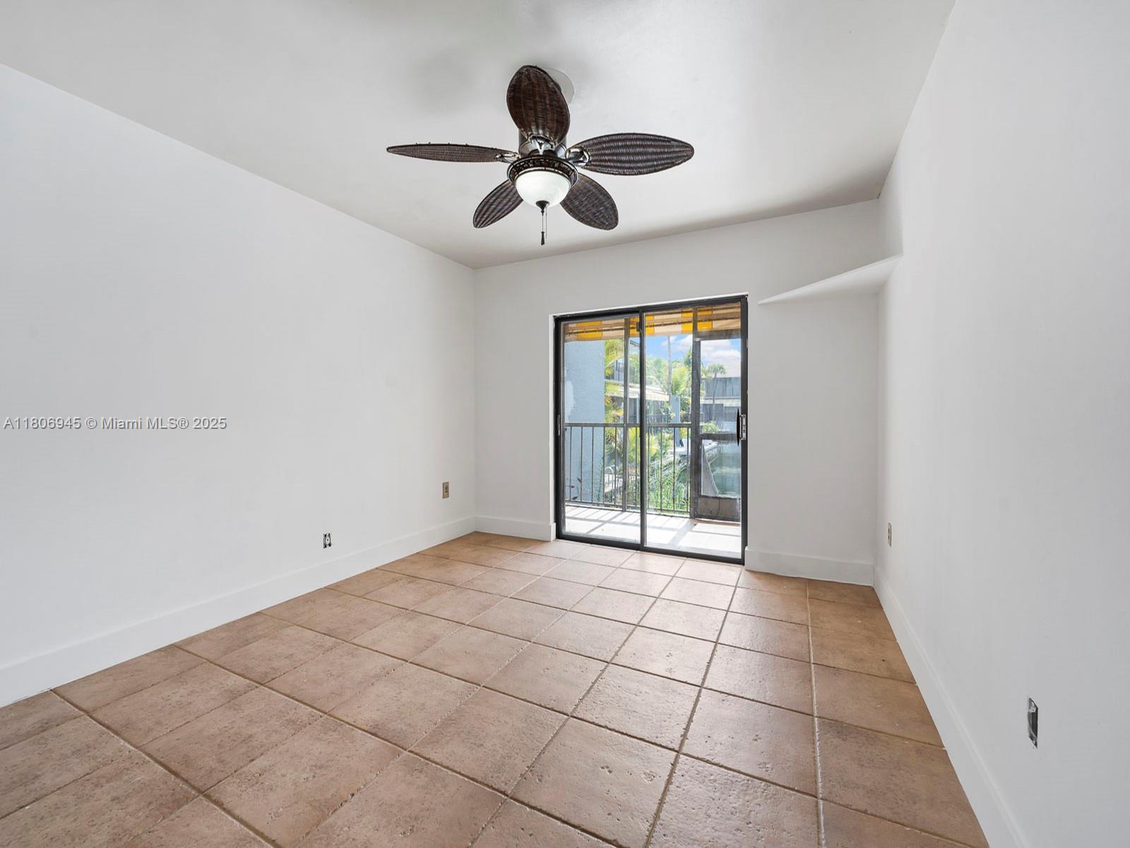 16380 Briar Patch Place Miami Lakes, FL 33014 - Photo 14 of 35 a view of an empty room with a window