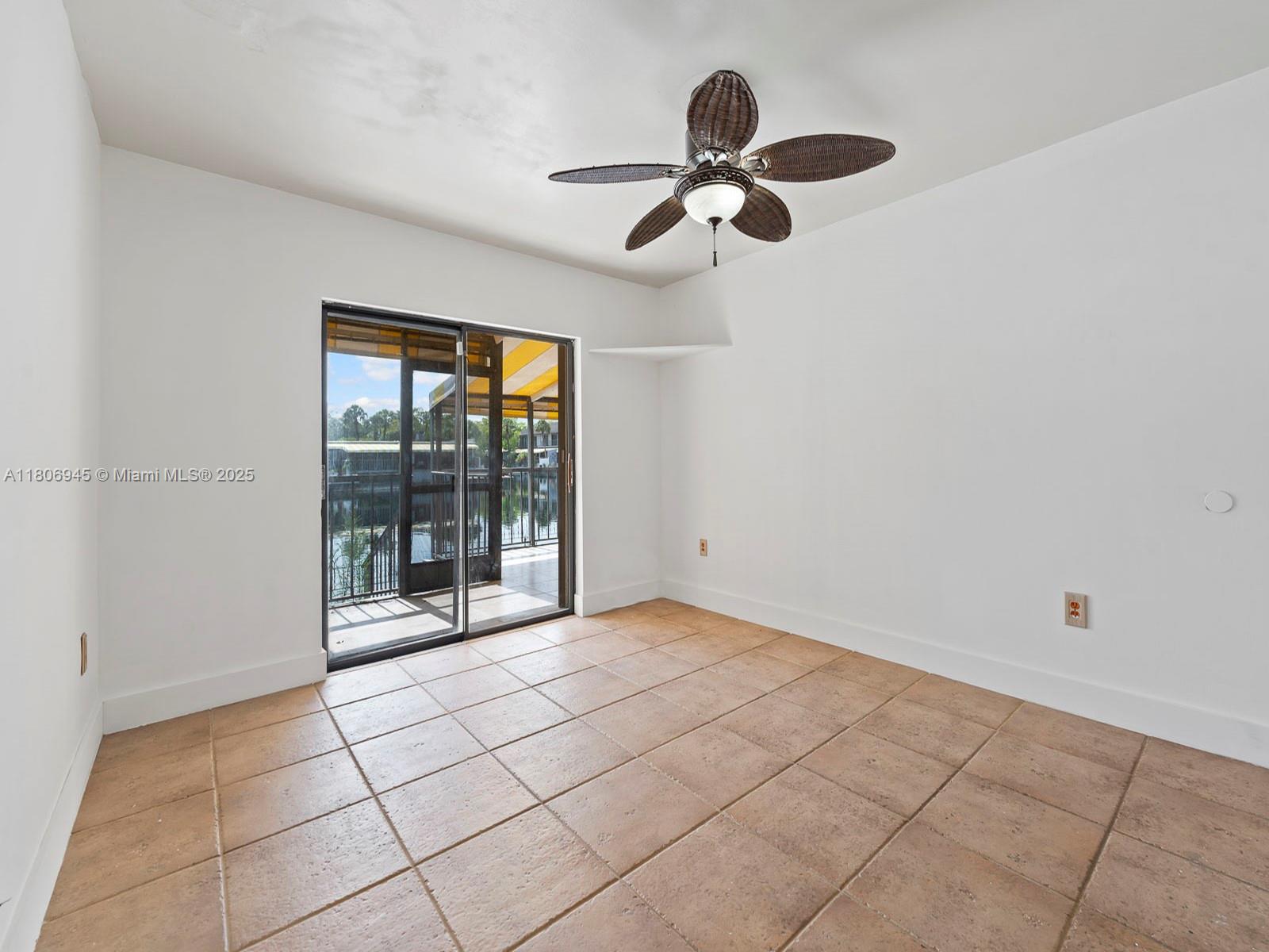 16380 Briar Patch Place Miami Lakes, FL 33014 - Photo 15 of 35 a view of an empty room with a window