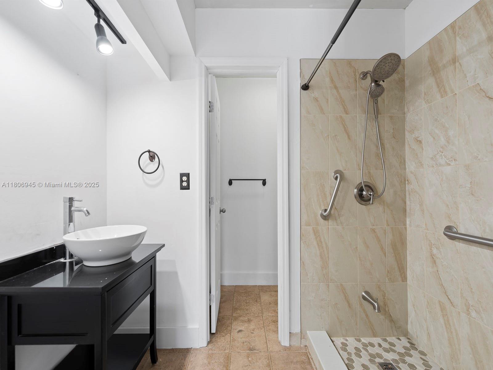 16380 Briar Patch Place Miami Lakes, FL 33014 - Photo 18 of 35 a bathroom with a sink a toilet and shower