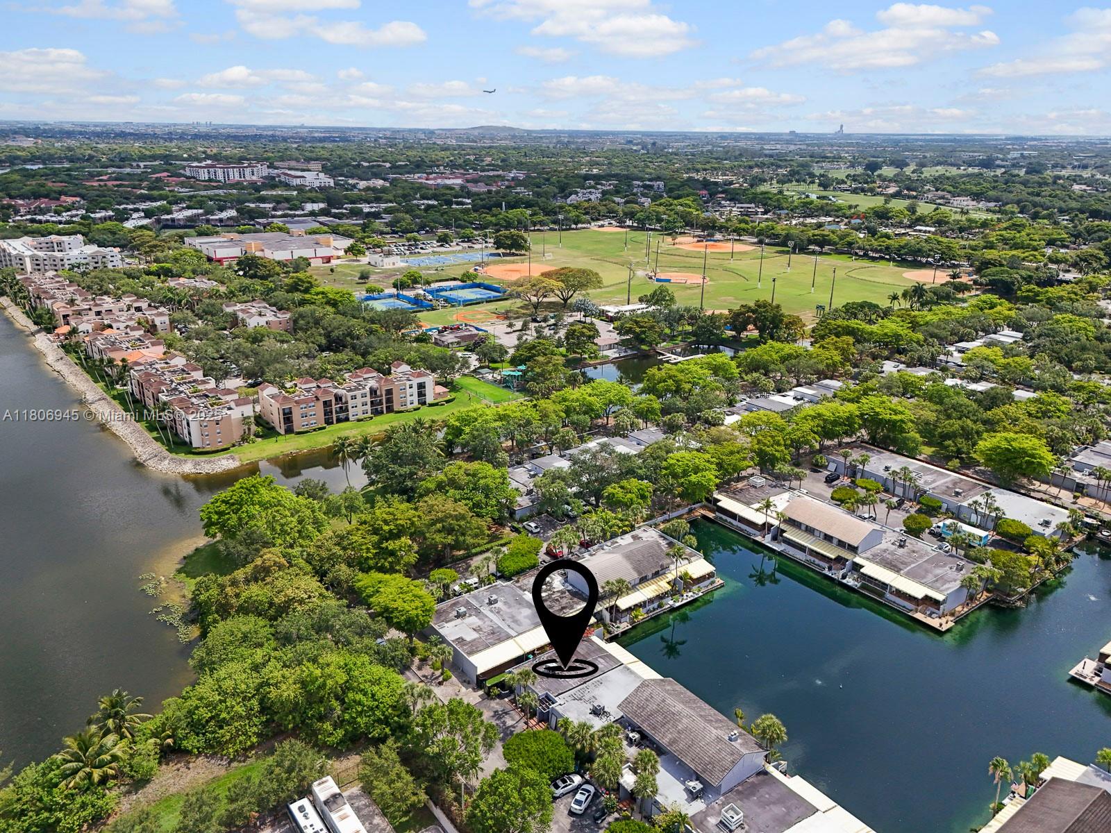 16380 Briar Patch Place Miami Lakes, FL 33014 - Photo 32 of 35 an aerial view of residential houses with outdoor space