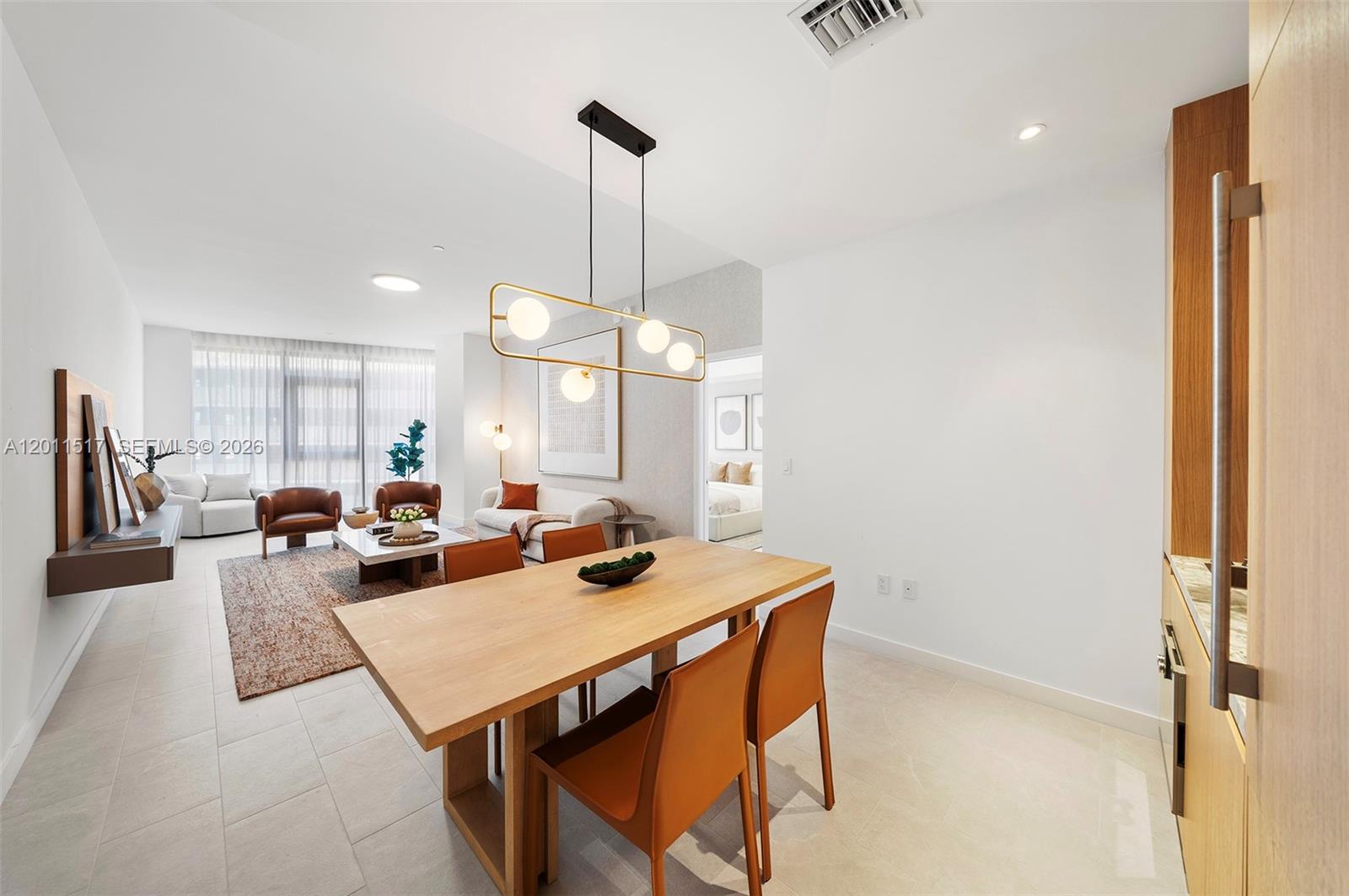 500 Alton Road, Unit 501 Miami Beach, FL 33139 - Photo 6 of 14 a view of a dining room and livingroom view