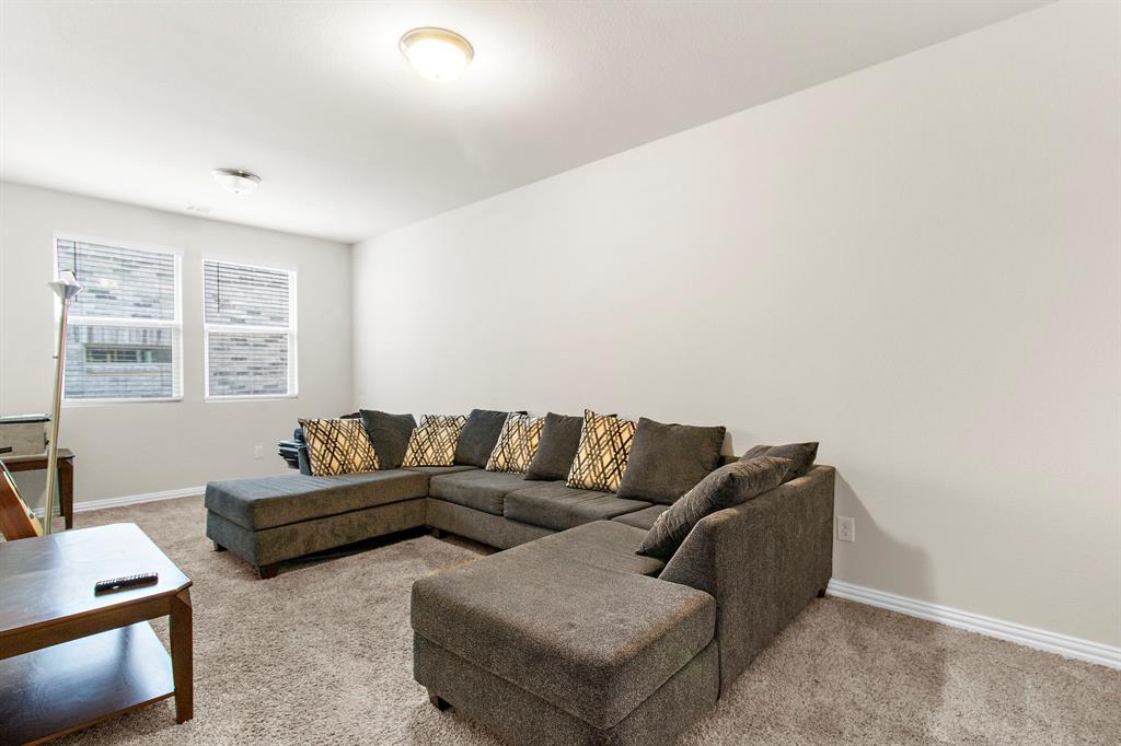 1211 Sweetleaf Street Melissa, TX 75454 - Photo 15 of 37 a living room with furniture and a window