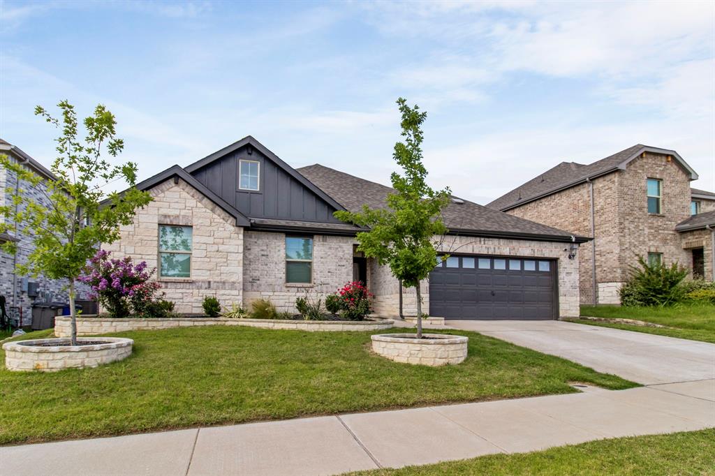 1211 Sweetleaf Street Melissa, TX 75454 - Photo 2 of 37 a front view of a house with a yard and potted plants