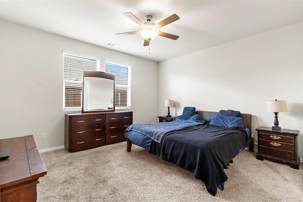 1211 Sweetleaf Street Melissa, TX 75454 - Photo 31 of 37 a bedroom with a bed and window
