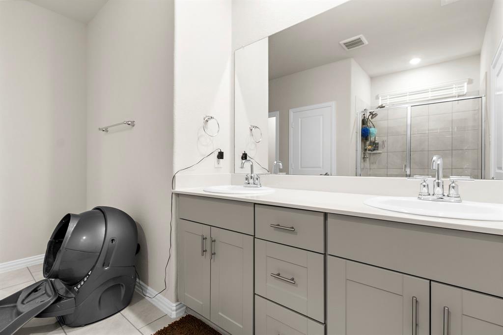 1211 Sweetleaf Street Melissa, TX 75454 - Photo 34 of 37 a bathroom with a sink and a mirror