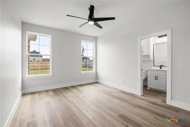 a view of a house with a yard and a street view