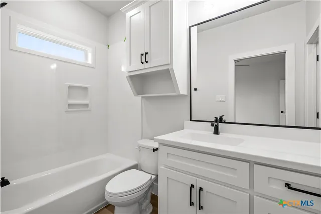 a big house with a big yard and large trees