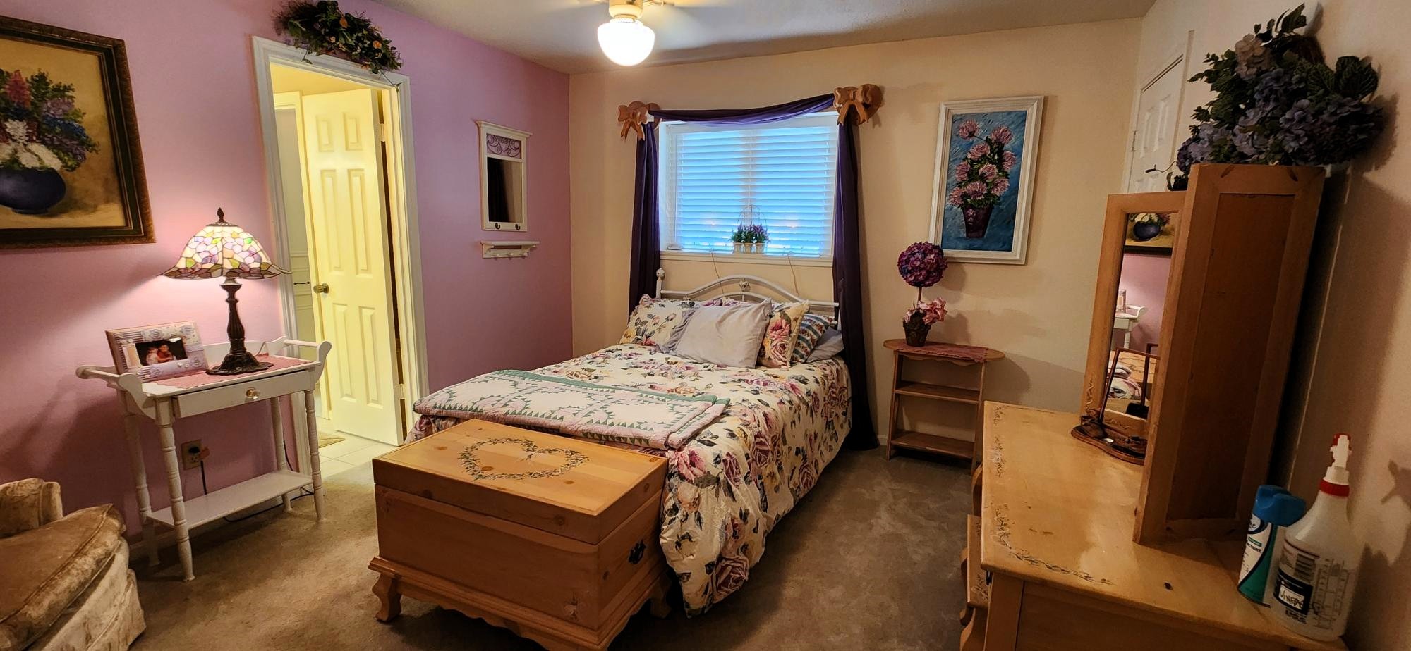 16155 Hexham Drive Spring, TX 77379 - Photo 30 of 47 a bedroom with a bed and a flat tv screen on the dresser