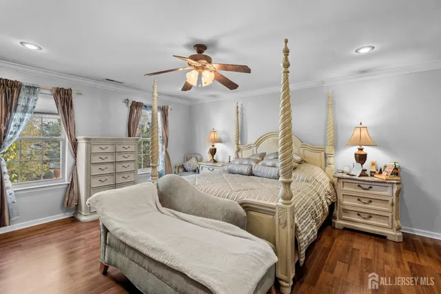 a bedroom with bed and window