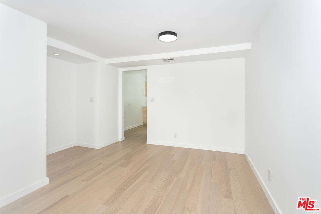 560 North Kings Road, Unit 2 West Hollywood, CA 90048 - Photo 3 of 12 a view of a room with wooden floor