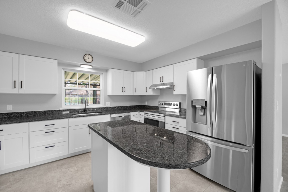 605 Helms Avenue Wharton, TX 77488 - Photo 16 of 45 Gorgeous black granite with blue "butterfly" sparkle! Must see!