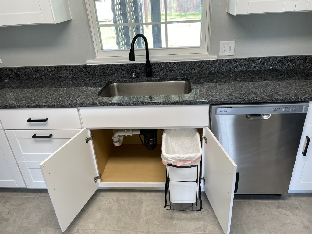 605 Helms Avenue Wharton, TX 77488 - Photo 20 of 45 Pull out trash can hidden beneath the sink