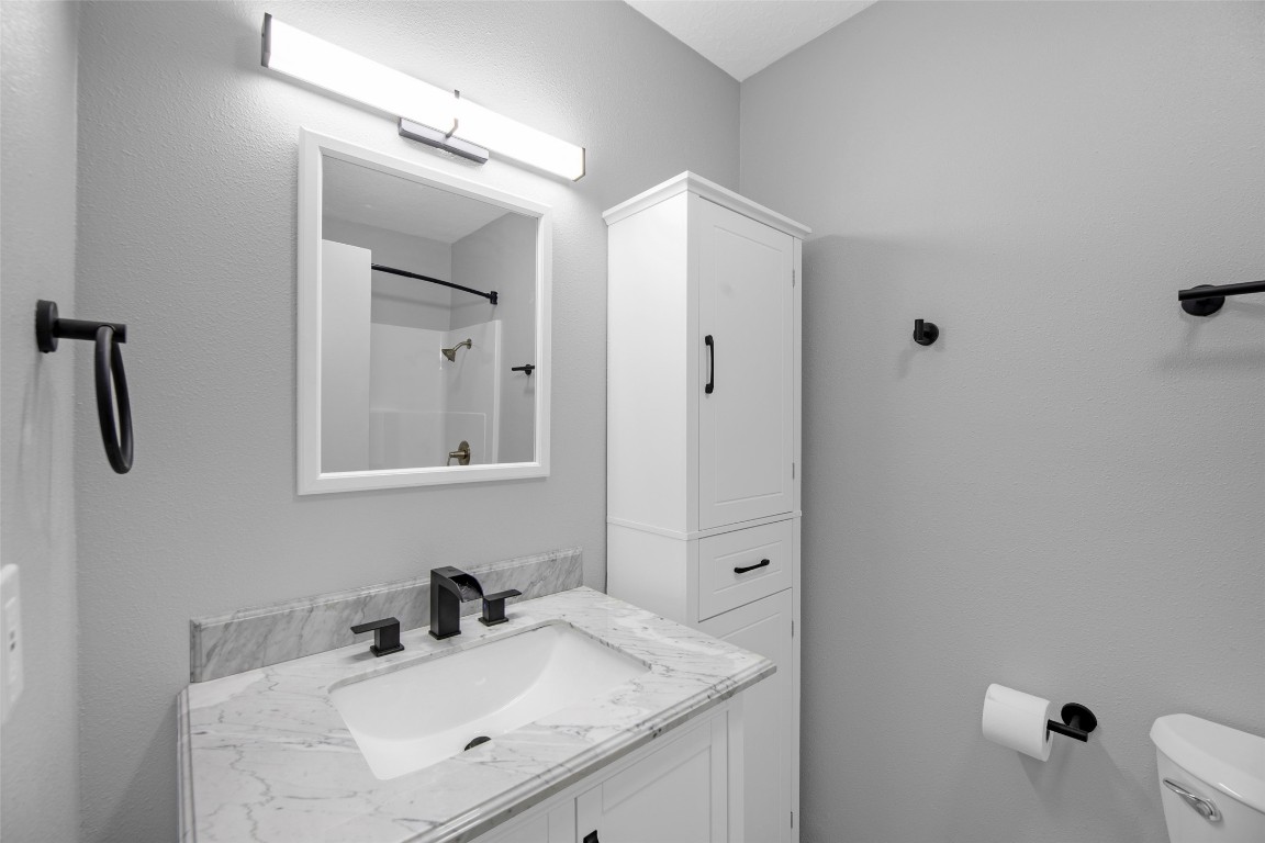 605 Helms Avenue Wharton, TX 77488 - Photo 23 of 45 Gorgeous White Cantera Marble Counter tops in bathrooms All new faucets, hardware and even the door hinges are new!