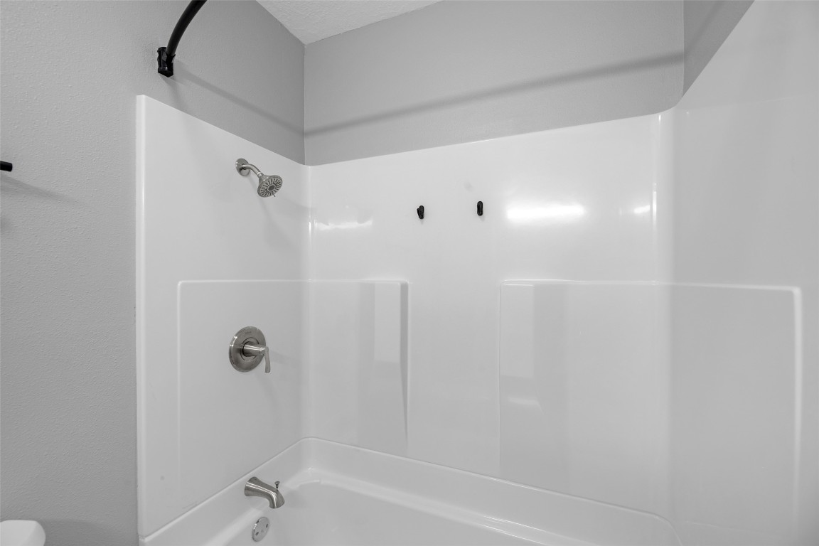 605 Helms Avenue Wharton, TX 77488 - Photo 24 of 45 Guest bath features brand new tub, shower surround and faucets!