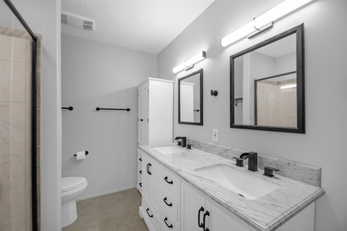 605 Helms Avenue Wharton, TX 77488 - Photo 31 of 45 The master en-suite with double vanities