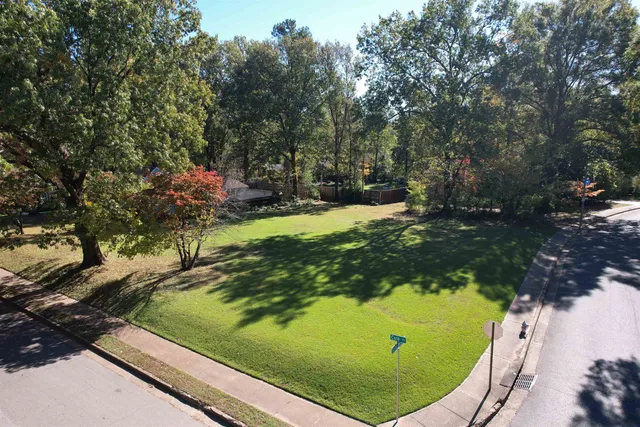 a view of swimming pool from a balcony
