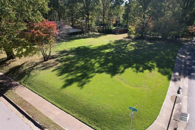 a view of pool with a yard