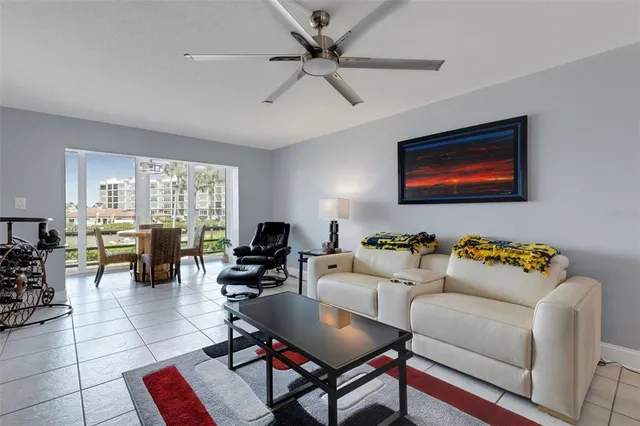 a kitchen with stainless steel appliances granite countertop a sink and refrigerator