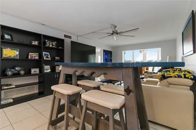 a view of a storage and utility room with a sink