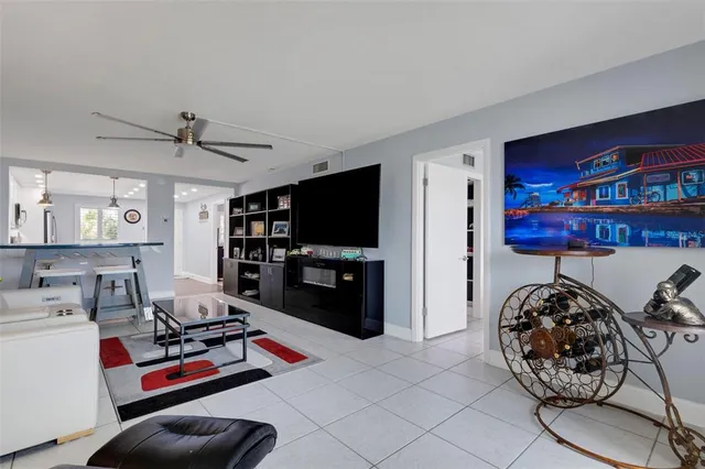 a kitchen with stainless steel appliances a stove a microwave and a refrigerator