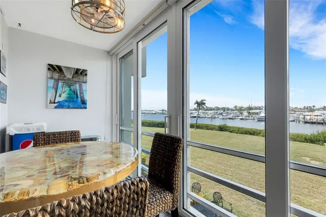 a kitchen with a sink stainless steel appliances and cabinets